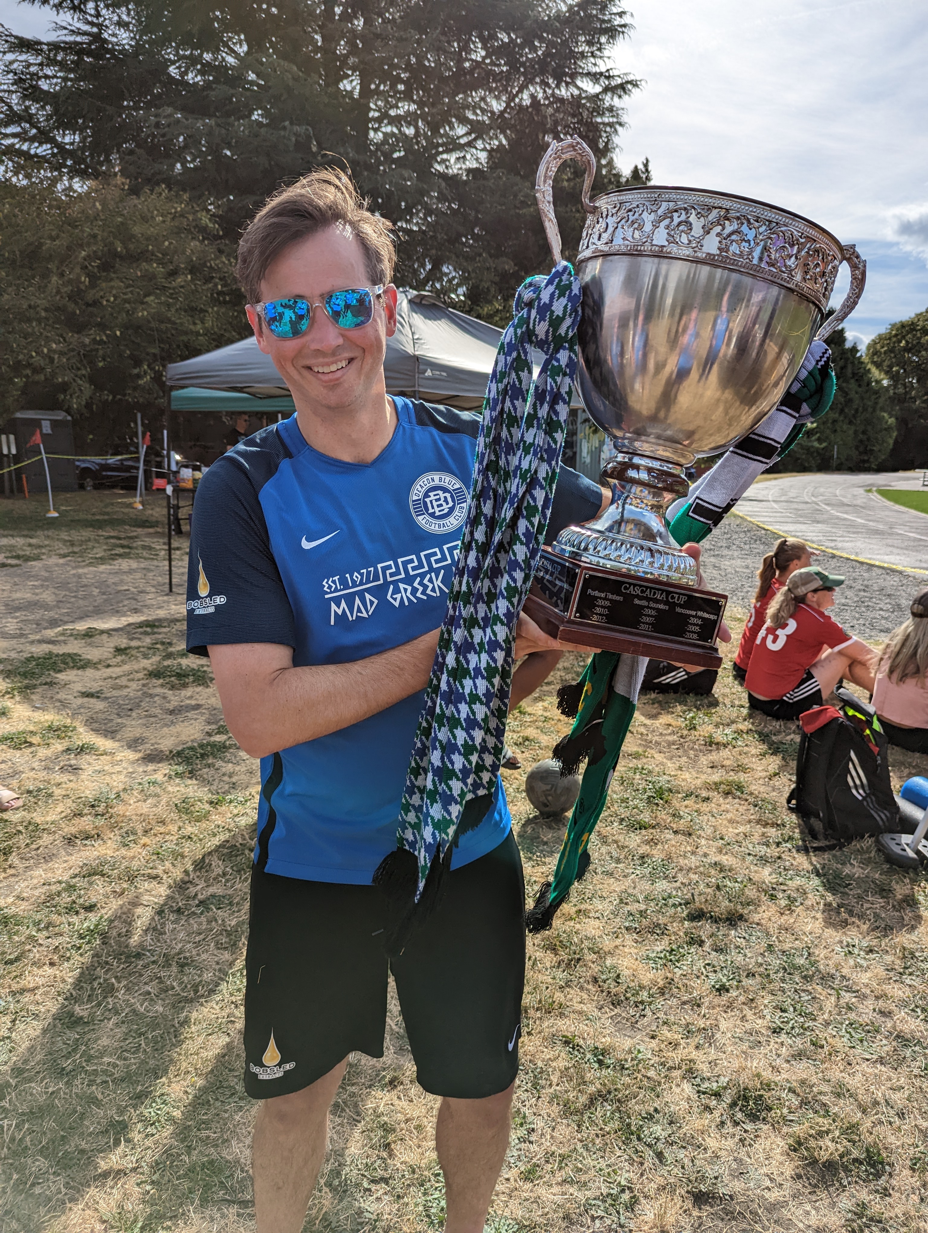Holding the trophy